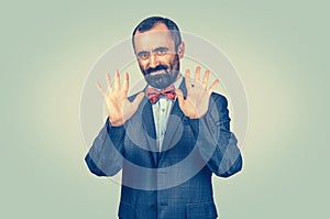 Man showing his palms, showing number ten with fingers gesture photo