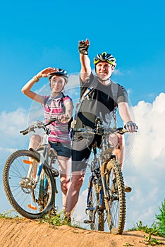 Man showing his wife the direction of travel