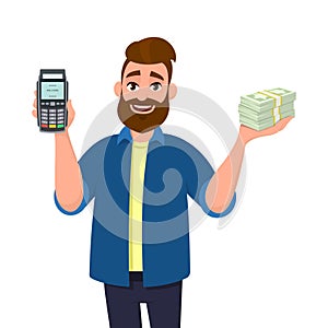 Man is showing or holding a POS terminal or credit, debit card swiping payment machine and bunch or cash, money, currency, bank.