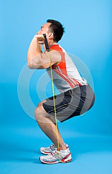 Man showing how to use tubing to strengthen