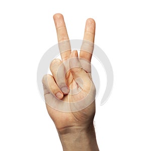 Man showing letter K isolated on white background, closeup. Finger spelling alphabet in American Sign Language. ASL concept