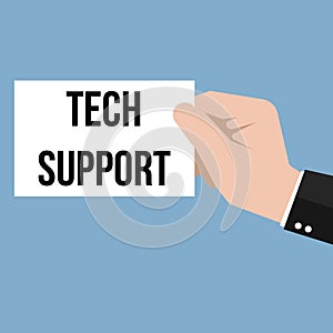 Man showing paper TECH SUPPORT text