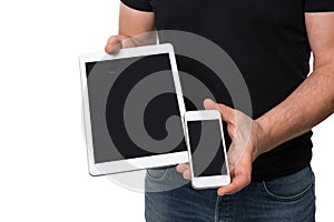 Man showing tablet vs smartphone