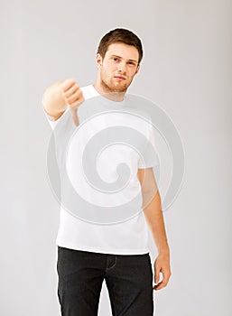 Man showing thumbs down