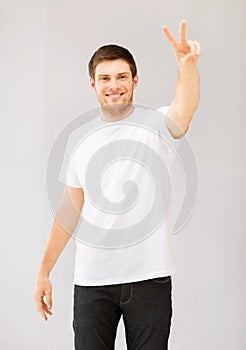 Man showing victory or peace sign