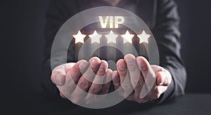 Man showing VIP word with five stars