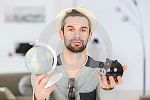 man showing world and savings