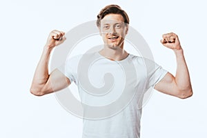 Man showing yeah gesture while looking