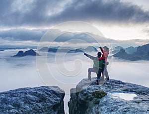 Man shows girlfriend something interesting in far distance