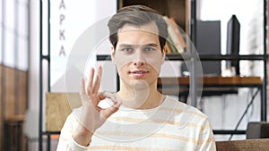 Man shows ok sign excellent job , Successful business