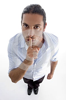 Man shushing with hand gesture