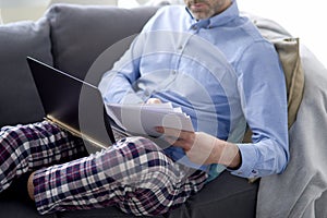 Man on sick leave working at home