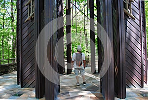 Man Sightseeing in Bell Tower at Garvin Woodland Gardens