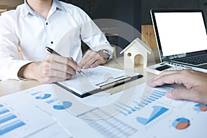 Man sign a home insurance policy on home loans