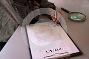 Man signing contract business man  focus on hand signing for new work