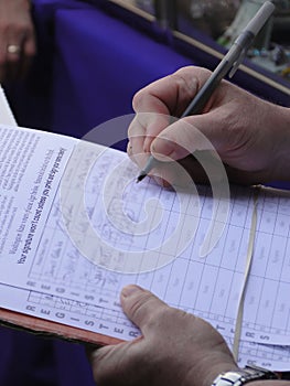 Man signing a petition