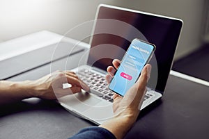 Man signs up to banking with her mobile phone