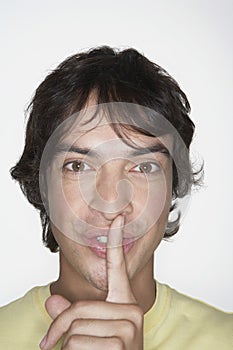 Man With Silence Gesture
