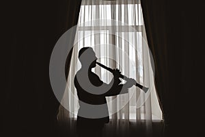 Man silhouette with clarinet