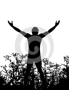 A man in silhouette standing in nature