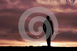 man silhouette and sunset background