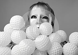 Man in a silver mask with a sheaf of nock bolls