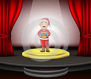 Man singing christmas carols standing on circle modern stage