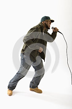 Man singing into microphone