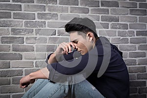 Man sit and feel depressed