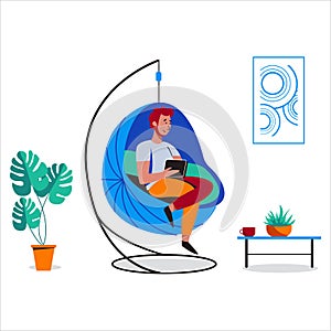 Man sit in hammock and working in friendly open space workplace. Coworking, freelance, teamwork, communication