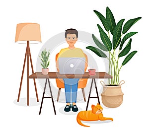 Man sits at a table, works at a computer at home. Remote work, freelance, home office, programming, training. Cozy