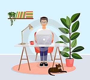 Man sits at a table, works at a computer at home. Remote work, freelance, home office, programming, training. Cozy