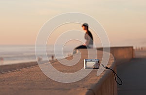 Man Sitting Alone Sunset Beach and Camera