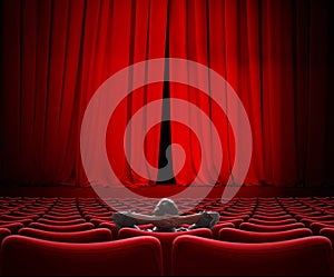 Man sitting alone in VIP movie theater hall 3d illustration