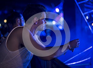 Man Sitting Alone Watching Live Concert