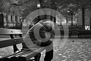 Man Sitting On Bench With His Head Down And Hands Covering His Face, Appearing To Be In Emotional Pain Or Grief. Generative AI