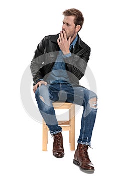 Man sitting bored