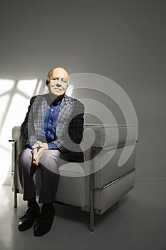 Man sitting in chair.