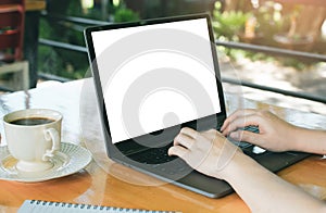 the man sitting the chair research course online website and studying learning on a mockup white screen laptop. e-learning