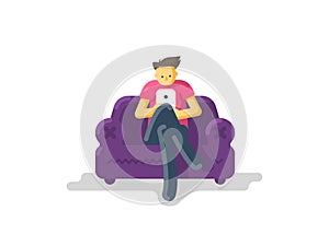 Man sitting on a couch with tablet or phone.