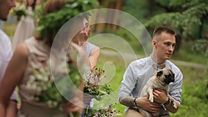 Man sitting with dog wedding