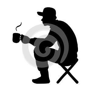 Man sitting and drinking hot coffee