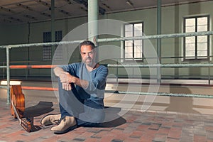 Man sitting in the floor, interior