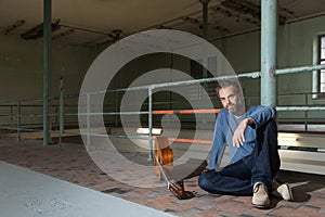 Man sitting in the floor, interior