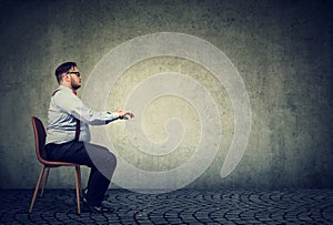 Man sitting at imaginary table