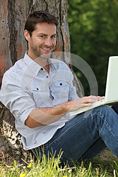 Man sitting with laptop