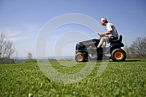 Man sitting on a lawnmower