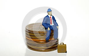 Man Sitting On Pennies