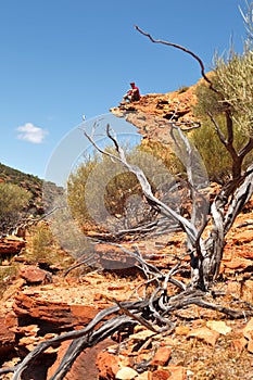 Man sitting on the rock edge