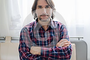 Man sitting in sofa at home